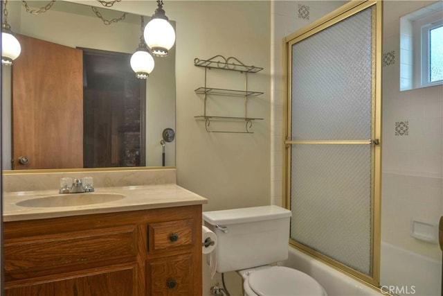 28680 Zion Dr, Lake Arrowhead, CA 92352 - full bathroom with enclosed tub / shower combo, vanity, and toilet