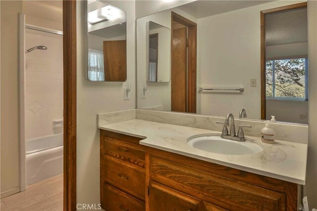 28680 Zion Dr, Lake Arrowhead, CA 92352 - full bathroom featuring vanity and shower / washtub combination