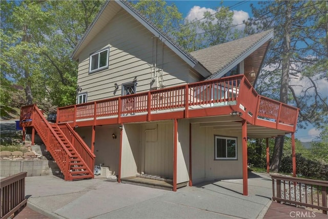 28680 Zion Dr, Lake Arrowhead, CA 92352 - back of property featuring a patio area, a wooden deck, and stairs