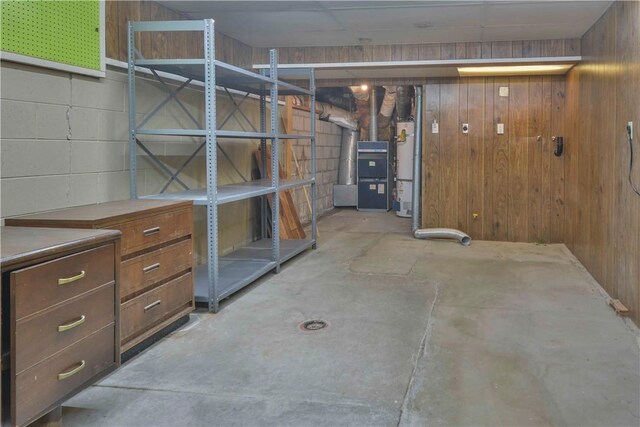 28680 Zion Dr, Lake Arrowhead, CA 92352 - below grade area featuring wood walls, concrete block wall, and heating unit