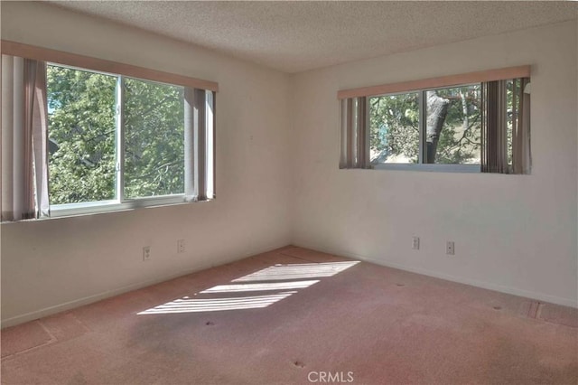 28680 Zion Dr, Lake Arrowhead, CA 92352 - carpeted spare room featuring a textured ceiling and baseboards