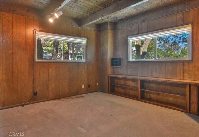 28680 Zion Dr, Lake Arrowhead, CA 92352 - interior space featuring wooden ceiling with exposed beams, plenty of natural light, wood walls, and carpet