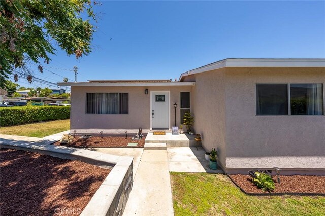 705 Pecos St, Spring Valley, CA 91977 - view of front of property featuring stucco siding