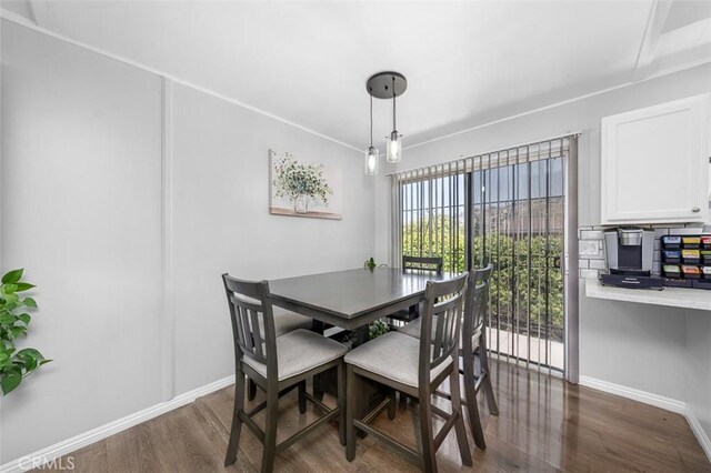 705 Pecos St, Spring Valley, CA 91977 - dining area featuring dark wood-type flooring and baseboards