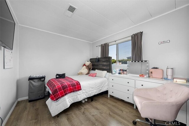 705 Pecos St, Spring Valley, CA 91977 - bedroom with wood finished floors and baseboards