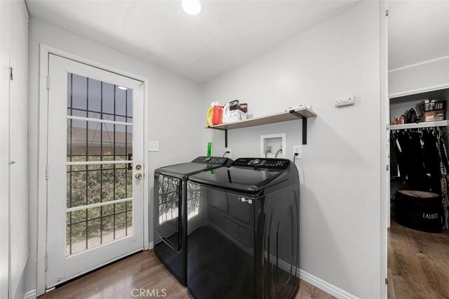 705 Pecos St, Spring Valley, CA 91977 - laundry area with separate washer and dryer, wood finished floors, and baseboards