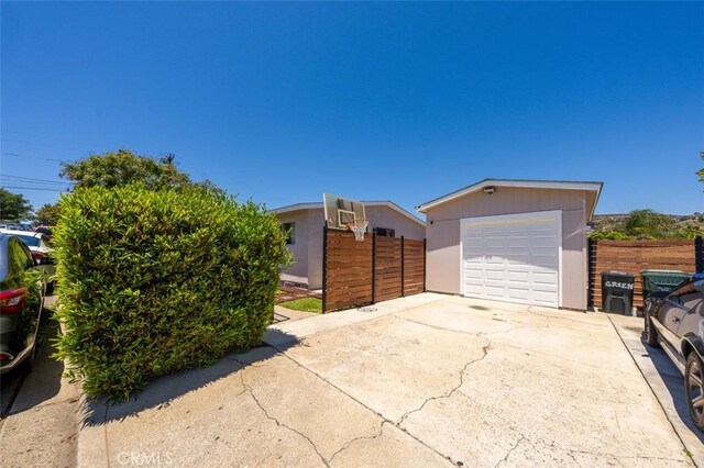 705 Pecos St, Spring Valley, CA 91977 - detached garage featuring driveway