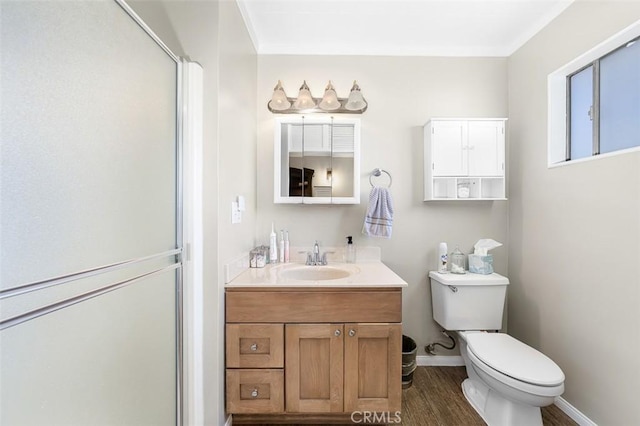 705 Pecos St, Spring Valley, CA 91977 - full bath with toilet, vanity, an enclosed shower, ornamental molding, and wood finished floors