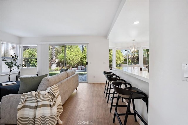 24775 Calle Serranona, Calabasas, CA 91302 - living area featuring light wood-style floors, a chandelier, baseboards, and recessed lighting