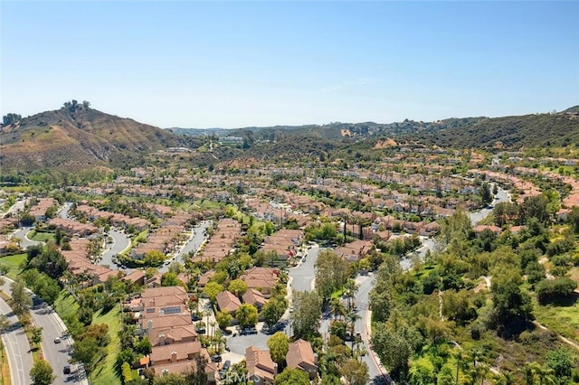 24775 Calle Serranona, Calabasas, CA 91302 - aerial overview of property's location with nearby suburban area and mountains