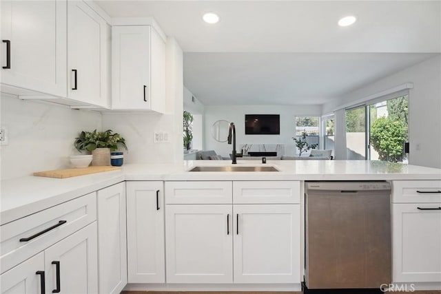 24775 Calle Serranona, Calabasas, CA 91302 - kitchen with dishwasher, a sink, white cabinetry, light countertops, and open floor plan