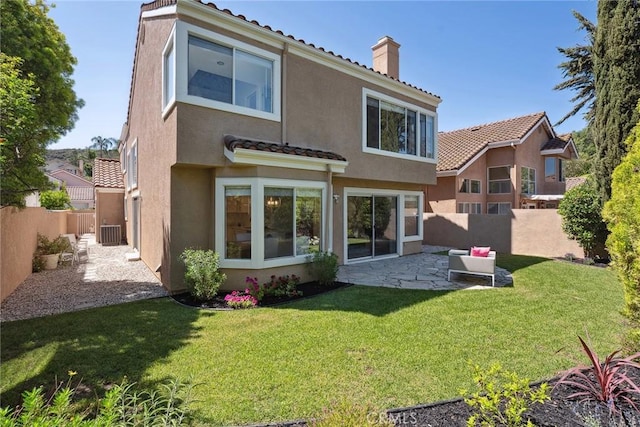 24775 Calle Serranona, Calabasas, CA 91302 - back of house with a chimney, a patio area, a tile roof, stucco siding, and central AC