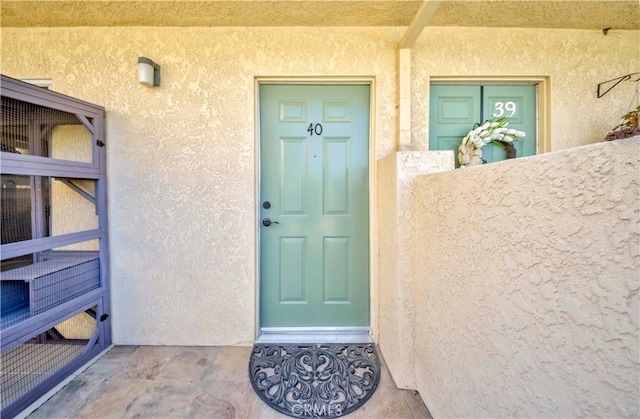 401 W 220th St Unit 40, Carson, CA 90745 - view of exterior entry with stucco siding