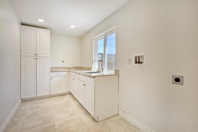 13815 Hilldale Rd, Valley Center, CA 92082 - laundry area featuring hookup for an electric dryer, hookup for a washing machine, cabinet space, baseboards, and light tile patterned flooring
