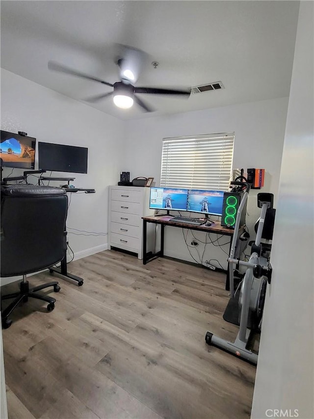 1485 Hansen Ave, Merced, CA 95340 - office space with light wood-style floors, a ceiling fan, and baseboards