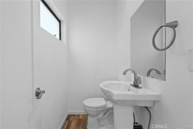 41363/4 Normal Ave Unit 3/4, Los Angeles, CA 90029 - bathroom with wood finished floors, toilet, and baseboards