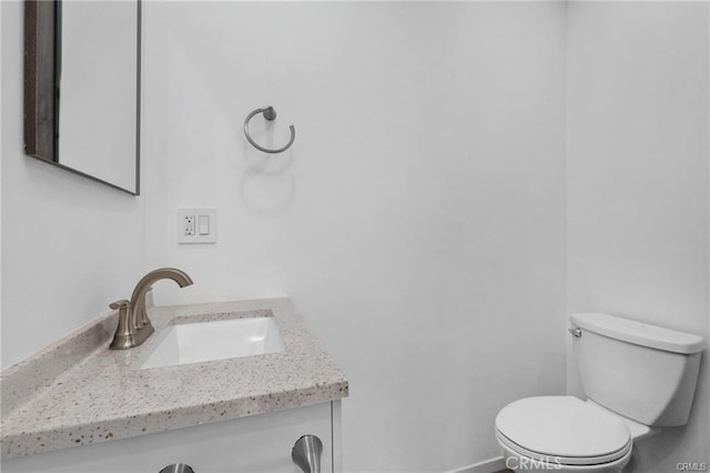 41363/4 Normal Ave Unit 3/4, Los Angeles, CA 90029 - half bathroom featuring toilet and vanity