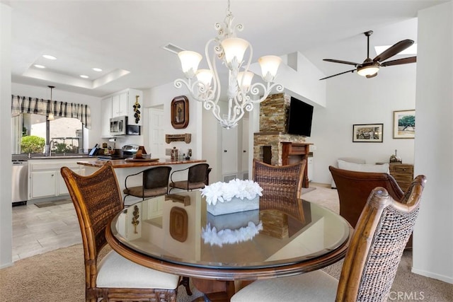 4119 Oak Island Ln, Fallbrook, CA 92028 - dining space with ceiling fan, a chandelier, recessed lighting, and light colored carpet