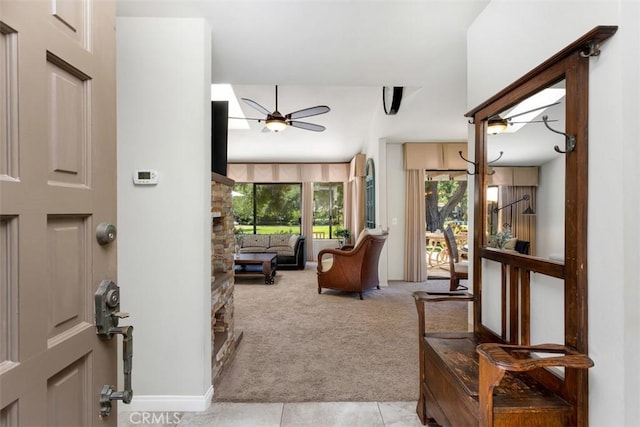 4119 Oak Island Ln, Fallbrook, CA 92028 - foyer entrance featuring a ceiling fan, light carpet, and light tile patterned flooring