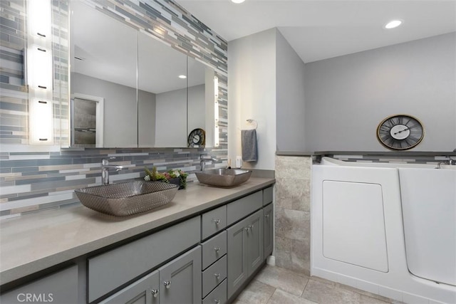 4119 Oak Island Ln, Fallbrook, CA 92028 - full bathroom with double vanity, recessed lighting, and backsplash