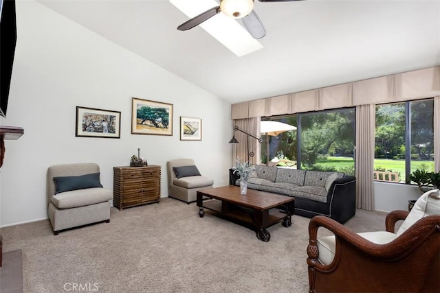 4119 Oak Island Ln, Fallbrook, CA 92028 - carpeted living area with ceiling fan, lofted ceiling, and a skylight