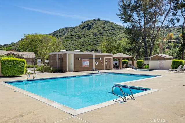 4119 Oak Island Ln, Fallbrook, CA 92028 - community pool featuring a mountain view and a patio area