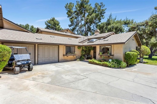 4119 Oak Island Ln, Fallbrook, CA 92028 - view of front facade featuring a garage, a shingled roof, driveway, a chimney, and stucco siding