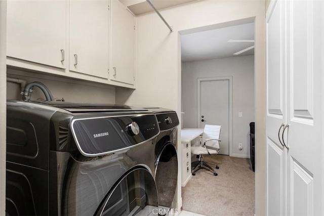 4119 Oak Island Ln, Fallbrook, CA 92028 - washroom with washing machine and dryer, cabinet space, light colored carpet, and a desk