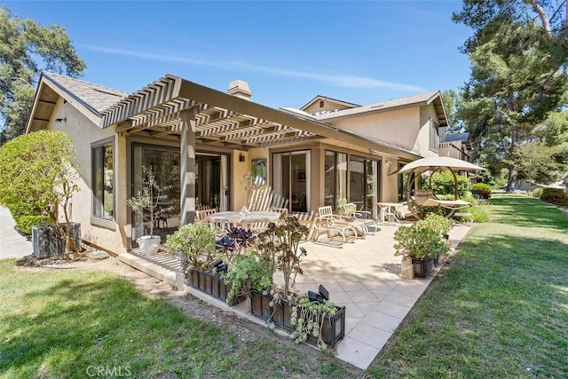 4119 Oak Island Ln, Fallbrook, CA 92028 - rear view of property featuring a pergola, a yard, stucco siding, a patio area, and a chimney