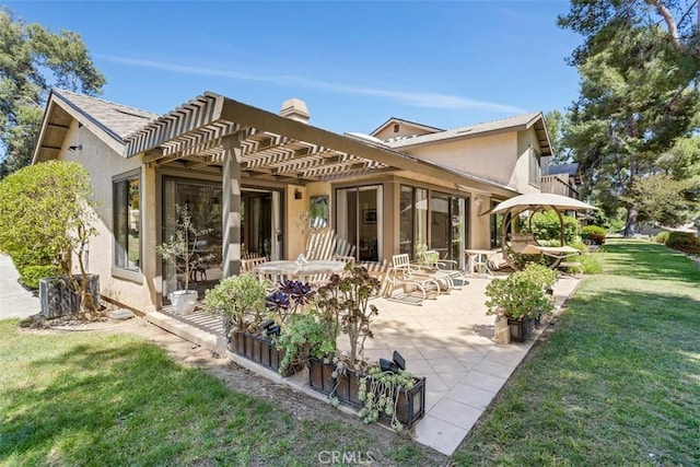 4119 Oak Island Ln, Fallbrook, CA 92028 - back of property featuring a pergola, a yard, stucco siding, and a patio