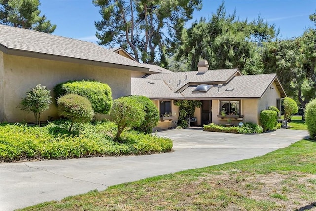 4119 Oak Island Ln, Fallbrook, CA 92028 - view of front of home featuring stucco siding, a chimney, and roof with shingles