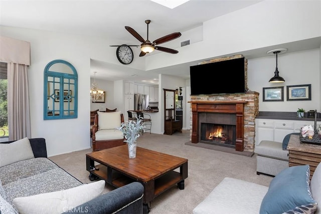 4119 Oak Island Ln, Fallbrook, CA 92028 - living room featuring light carpet, a ceiling fan, a fireplace, and a chandelier