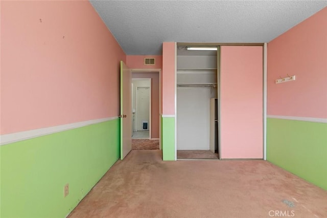 1713 Roanoke St, Placentia, CA 92870 - unfurnished bedroom with carpet, a closet, and a textured ceiling