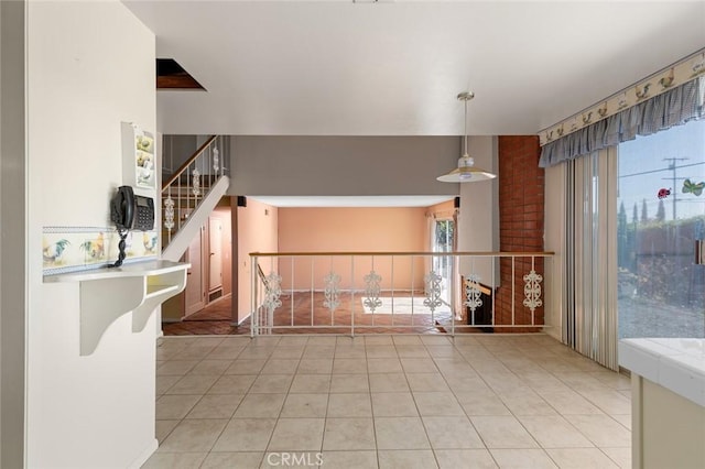1713 Roanoke St, Placentia, CA 92870 - kitchen featuring light tile patterned floors and decorative light fixtures