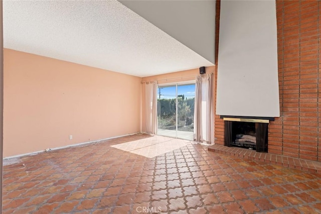 1713 Roanoke St, Placentia, CA 92870 - unfurnished living room featuring a fireplace, a textured ceiling, and baseboards