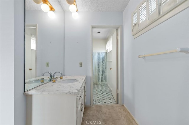 1713 Roanoke St, Placentia, CA 92870 - bathroom featuring plenty of natural light, vanity, a shower, and a textured ceiling