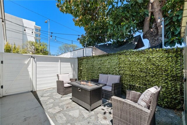 21322 S Western Ave, Torrance, CA 90501 - view of patio / terrace featuring an outdoor living space with a fire pit