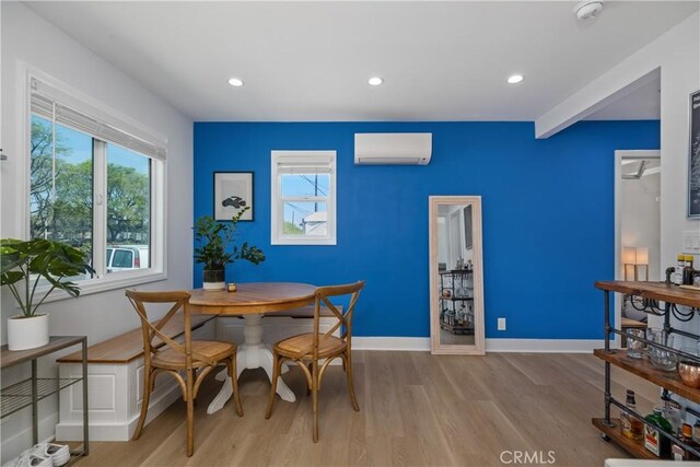 21322 S Western Ave, Torrance, CA 90501 - dining space with a wall mounted AC, wood finished floors, recessed lighting, and baseboards