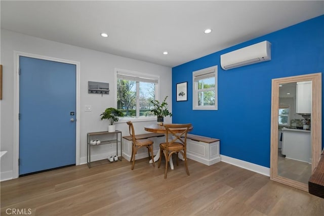 21322 S Western Ave, Torrance, CA 90501 - dining area with an AC wall unit, wood finished floors, recessed lighting, and baseboards