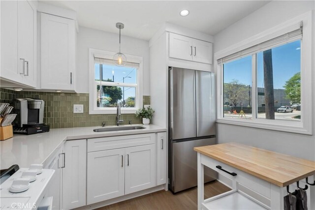 21322 S Western Ave, Torrance, CA 90501 - kitchen with freestanding refrigerator, a sink, wooden counters, healthy amount of natural light, and recessed lighting