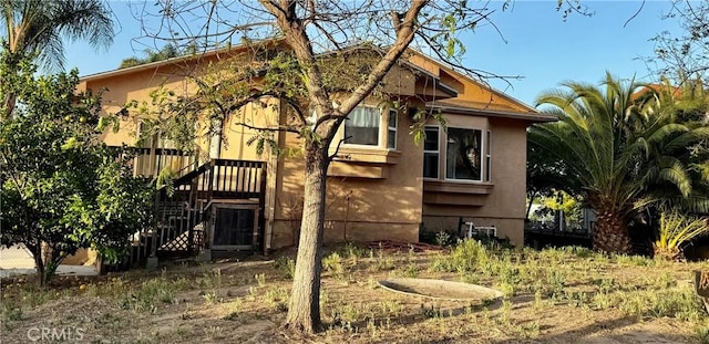 15192 Laguna Ave, Lake Elsinore, CA 92530 - rear view of house with stucco siding