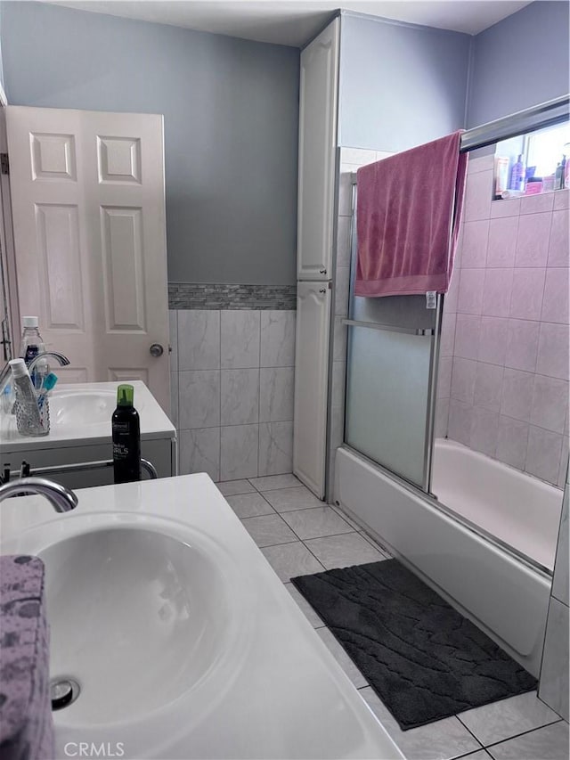 6223 Morse Ave, North Hollywood, CA 91606 - bathroom with bath / shower combo with glass door, vanity, tile walls, and wainscoting