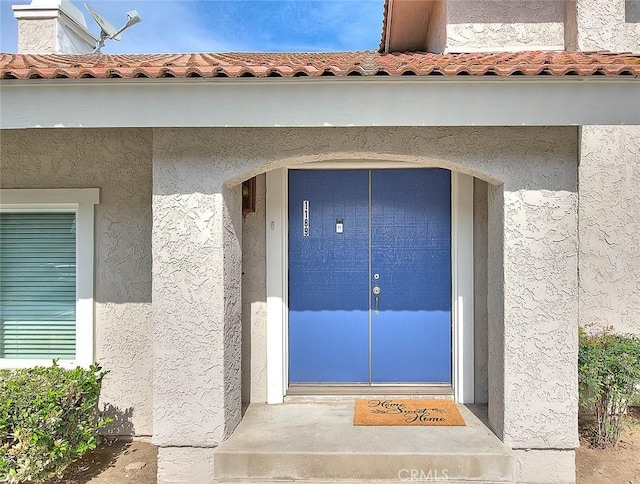 1189 N Sunflower Ave, Covina, CA 91724 - view of exterior entry featuring stucco siding