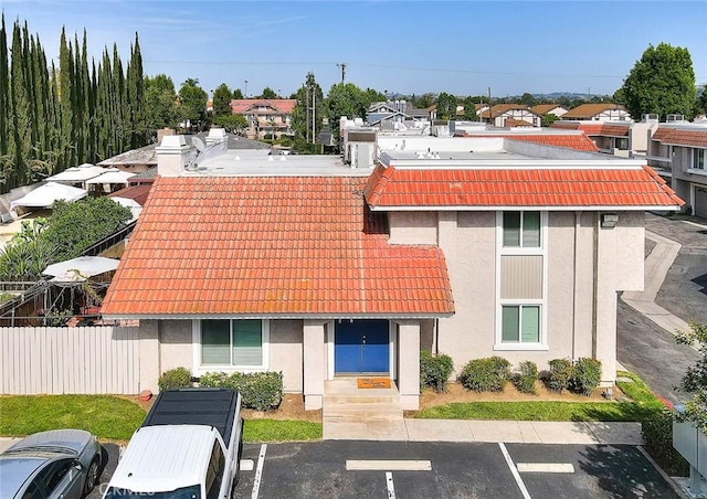 1189 N Sunflower Ave, Covina, CA 91724 - view of building exterior featuring uncovered parking and a residential view