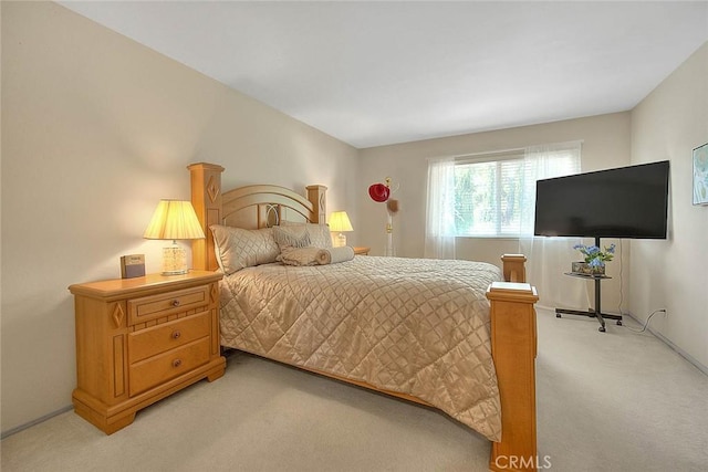 1189 N Sunflower Ave, Covina, CA 91724 - bedroom with light colored carpet and baseboards