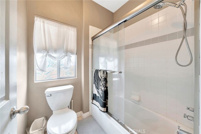 28747 La Triana, Laguna Niguel, CA 92677 - full bathroom with toilet, enclosed tub / shower combo, and baseboards