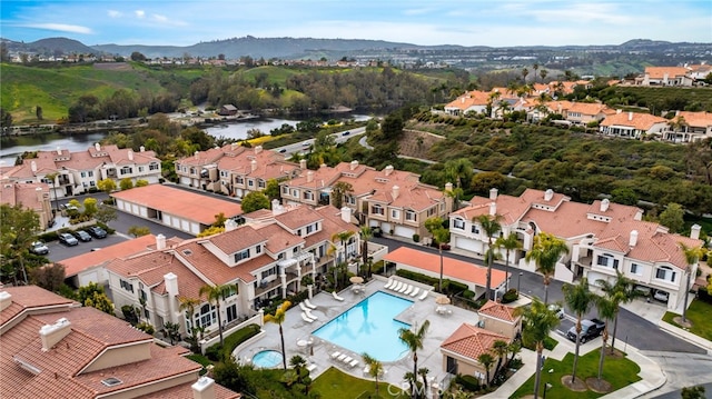 28747 La Triana, Laguna Niguel, CA 92677 - aerial perspective of suburban area featuring a water and mountain view and a pool area