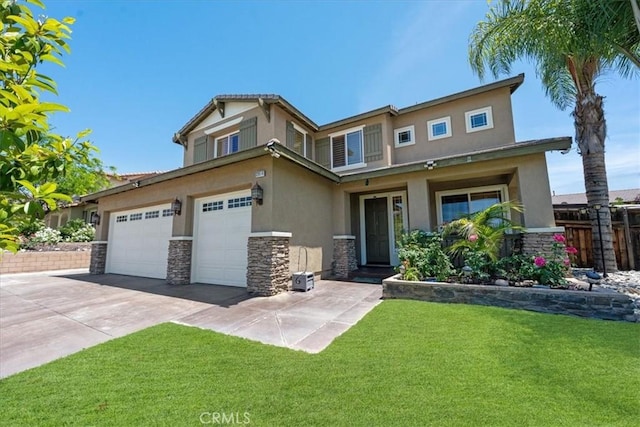 12614 Torrey Pine Rd, Moreno Valley, CA 92555 - view of front of home with stucco siding, driveway, and stone siding