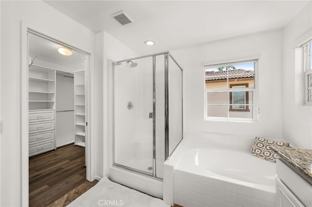 8090 Cornwall Ct Unit 33, Rancho Cucamonga, CA 91739 - bathroom with a stall shower, plenty of natural light, a bath, and recessed lighting