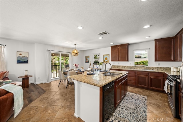 8090 Cornwall Ct Unit 33, Rancho Cucamonga, CA 91739 - kitchen with a sink, gas stove, black dishwasher, plenty of natural light, and recessed lighting